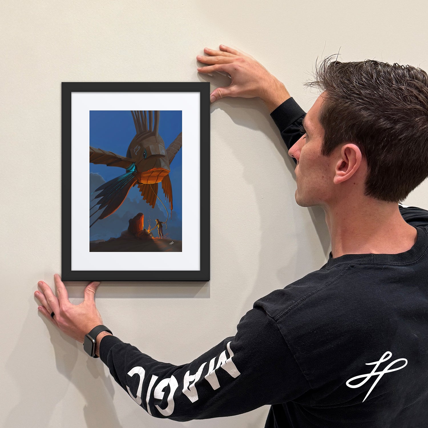 Jake Hartigan Holding a framed limited edition print of "Rescue"